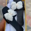 Zara Flat Sandals featuring a prominent, embellished bow detail